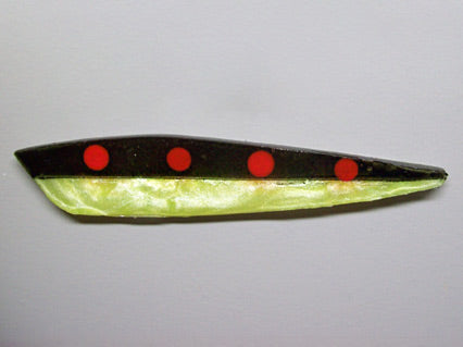 Rocket with black on top and red spots and yellow underbelly