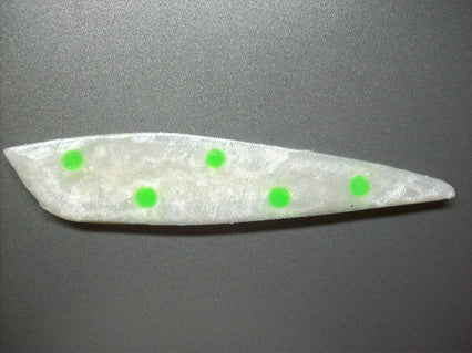 Pearly white Rocket with fluorescent green spots