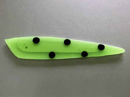 Fluorescent green Rocket with black spots