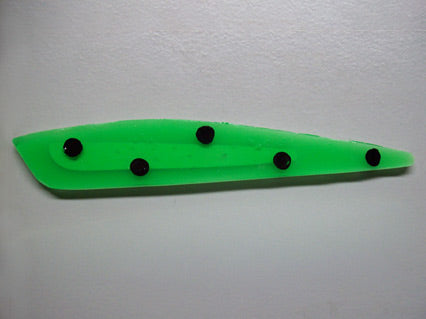 Translucent green Rocket with black spots
